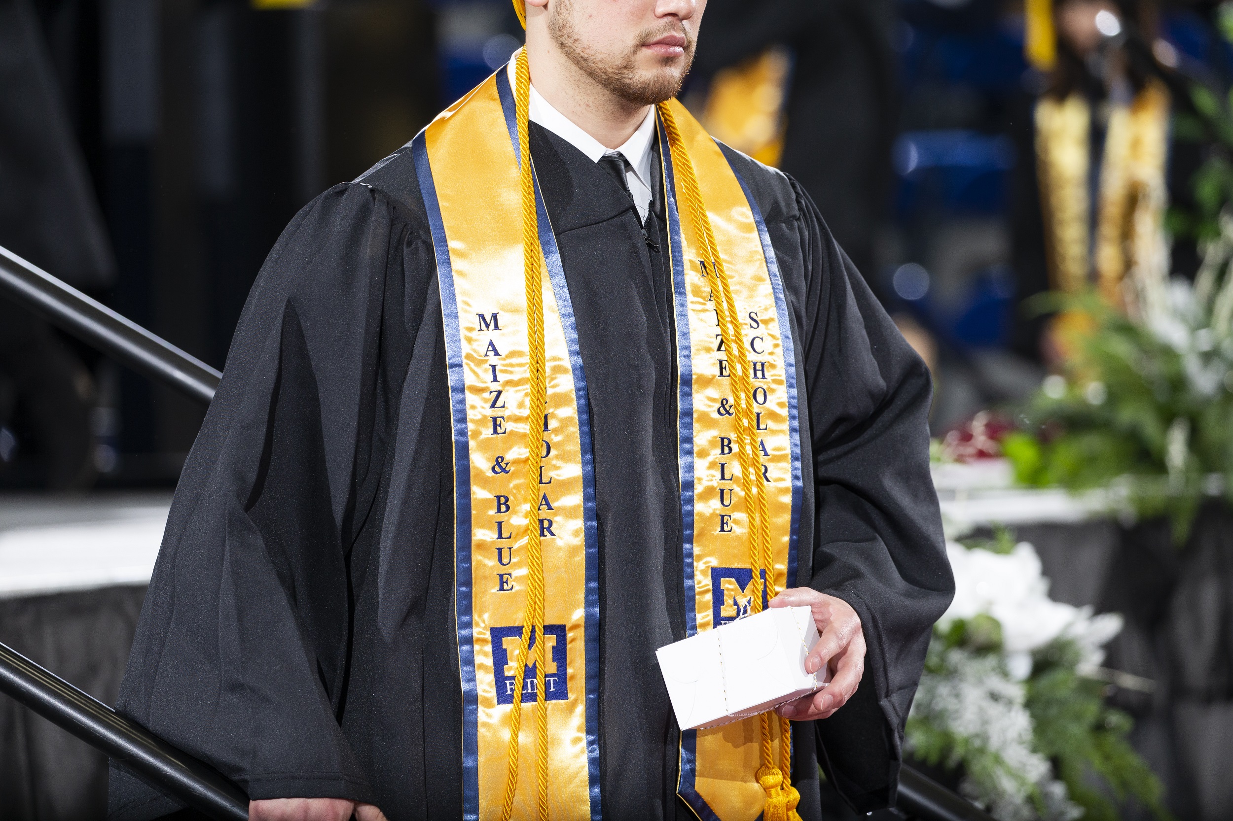 Photo of graduate at commencement ceremony