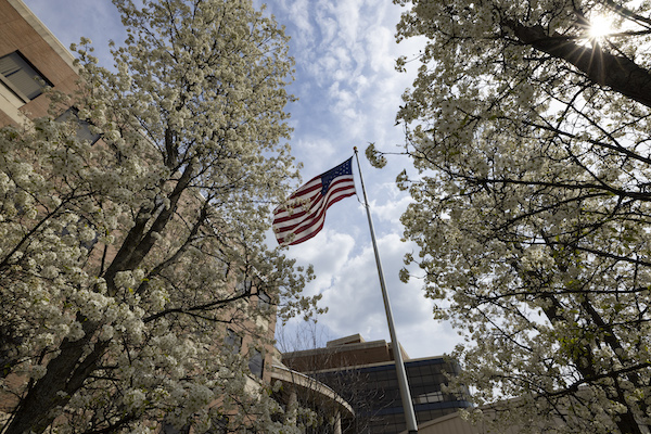 An American flag flies on UM-Flint's campus