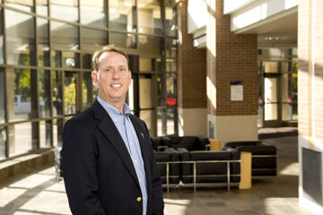 Photo of Thomas Henthorn in the Thompson Library