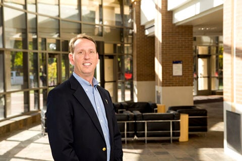 Photo of Thomas Henthorn in the Thompson Library