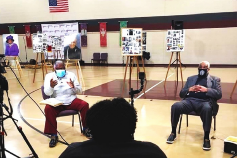 Two men being interviewed