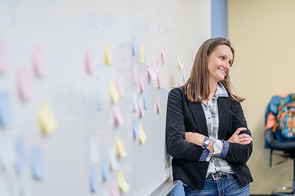 Dr. Heather Seipke at a whiteboard