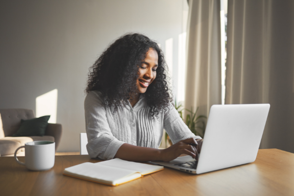 woman working on a laptop at home