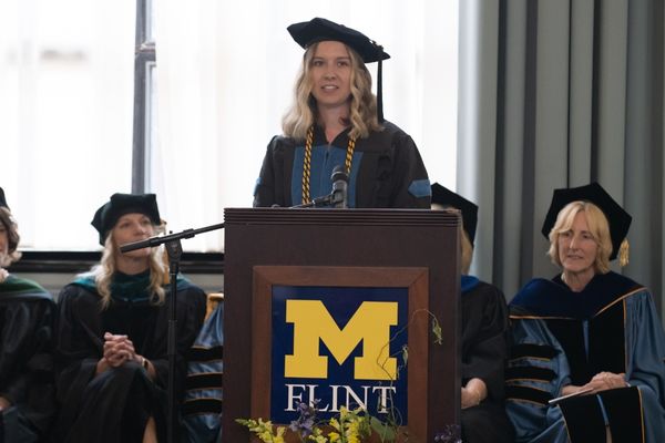 Graduate and student speaker Brady Harbaugh addresses her class at Commencement
