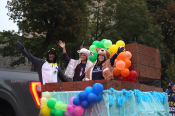 UM-Flint students on a parade float.