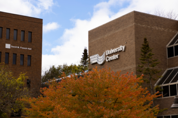 A view of the University Center and French Hall in fall.