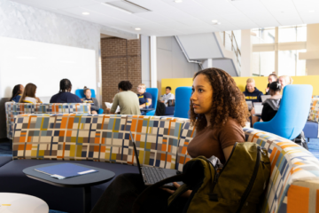 Students in the a lounge area in the Murchie Science Building Expansion