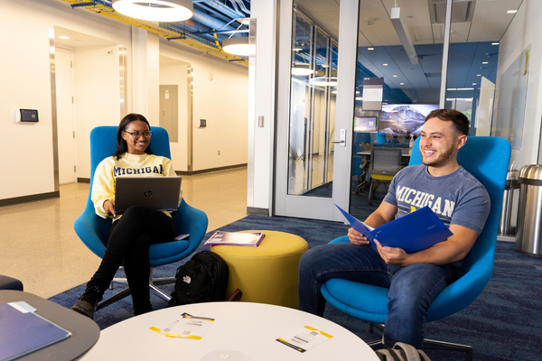 Two students sitting in a ommon area