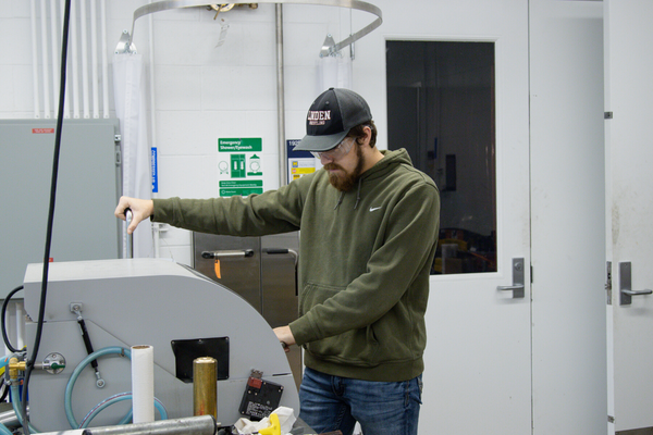 Avery Jacobs working on a student project in the first-floor lab.