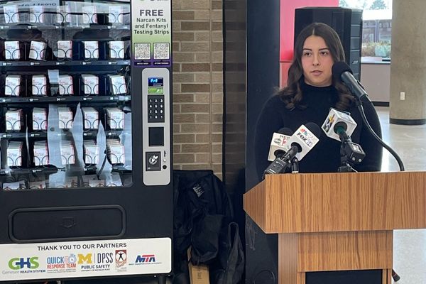 Lauren Allen speaks at a press conference. 