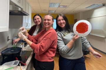 UM-Flint occupational therapy students make non-skid plates for Parkinson's patients in the program's innovations and technology lab.