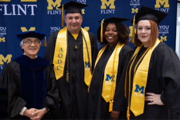 From left to right, AODC program director Roy Barnes, AODC graduates Michael Bernal, D'Mya Mason and Alizia Hamilton