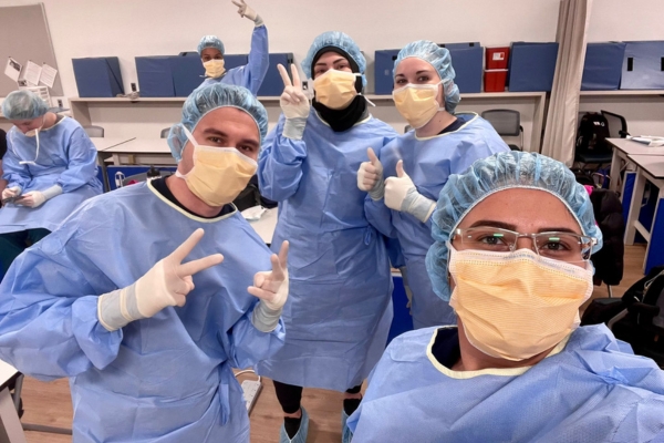 Nikola Ilic, Malak Abdallah, Rebecca Fulesi and Celeena Kawar participate in a lab during the PA program.