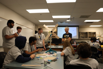 Image of students building a wind turbine at the CIT summer camp in 2022.