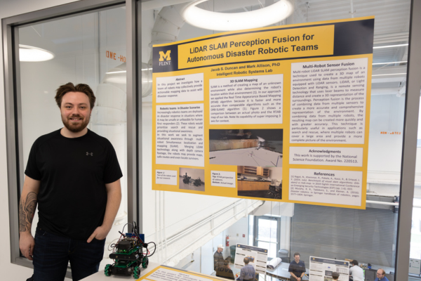 Jacob Duncan with his Autonomous Disaster Robot