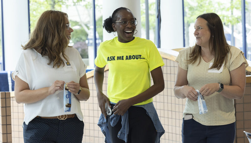 Students laughing at the Welcome Back BBQ