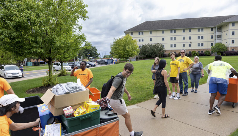 Students pulling items into First Street Residence Hall