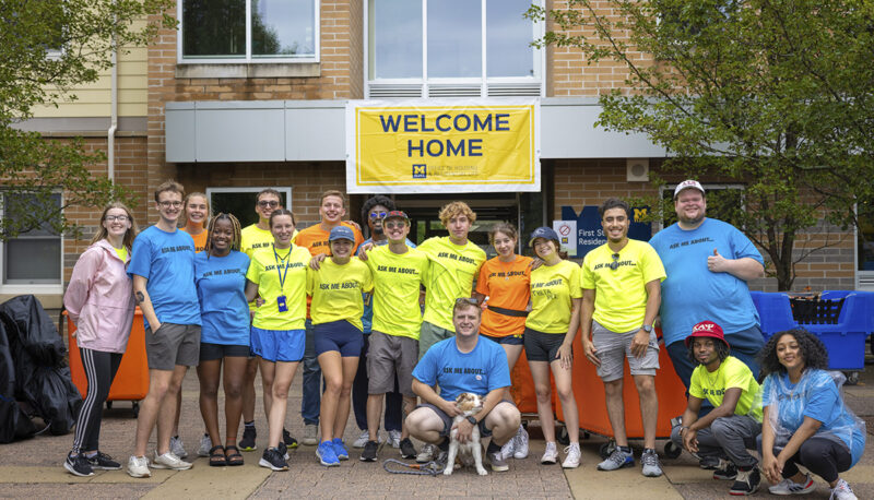 A group of studreet Residence Hallents posing outside First St