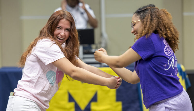 Two students dancing