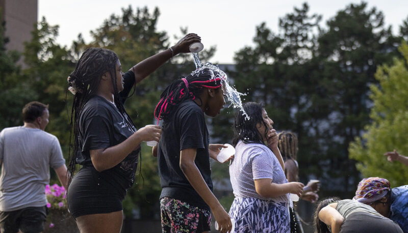 group of students having a water fight