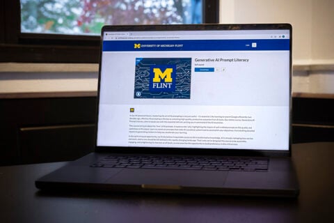 A laptop with the UM-Flint Generative AI Prompt Literacy course on the screen