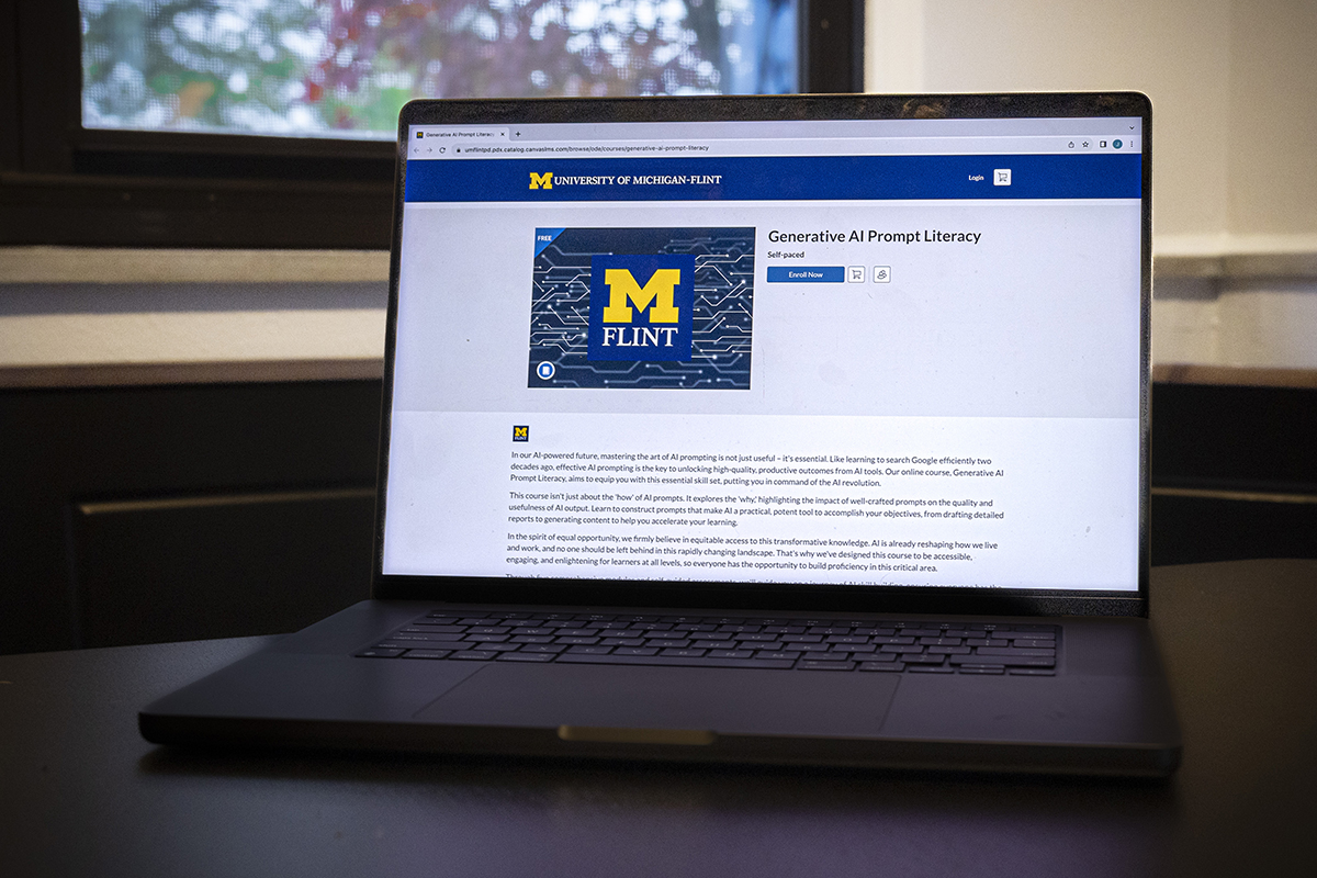 A laptop with the UM-Flint Generative AI Prompt Literacy course on the screen