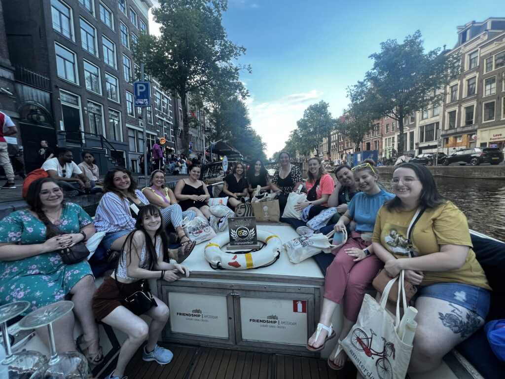 Students and faculty on a boat in Amsterdam