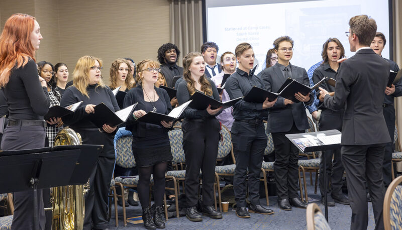 Choir members singing