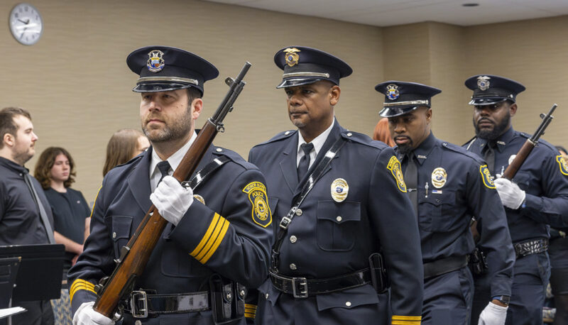 A police honor guard marching