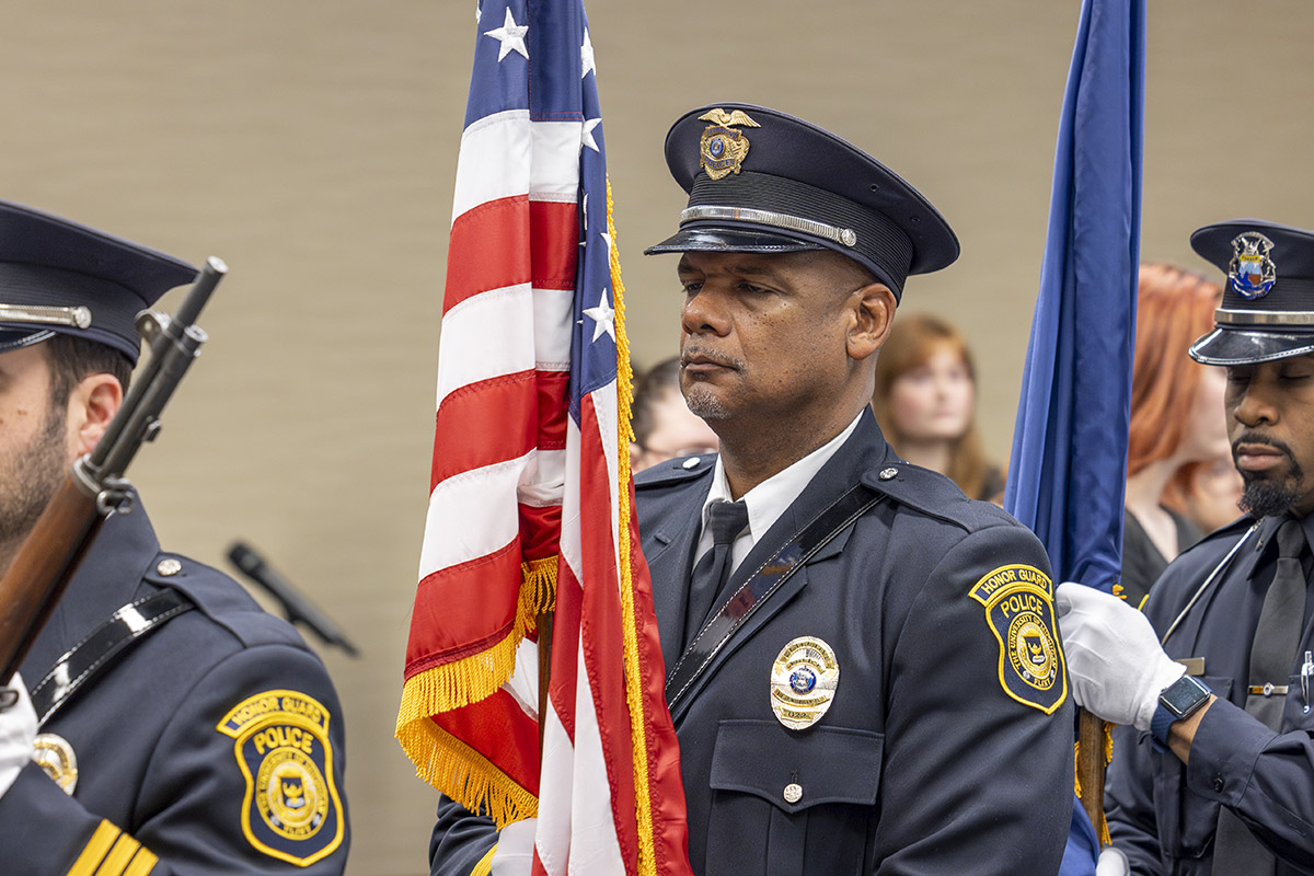 A police honor guard marching