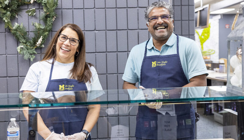 UM-Flint staffers behind the serving counter