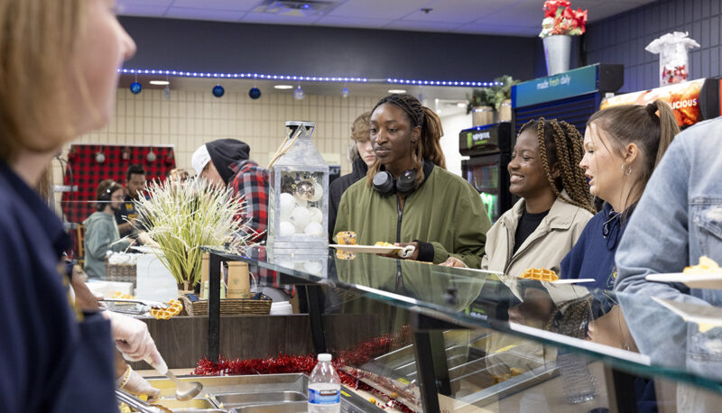 Students in line getting food