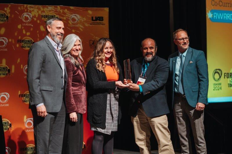 The USASBE award being presented to Mark Simon