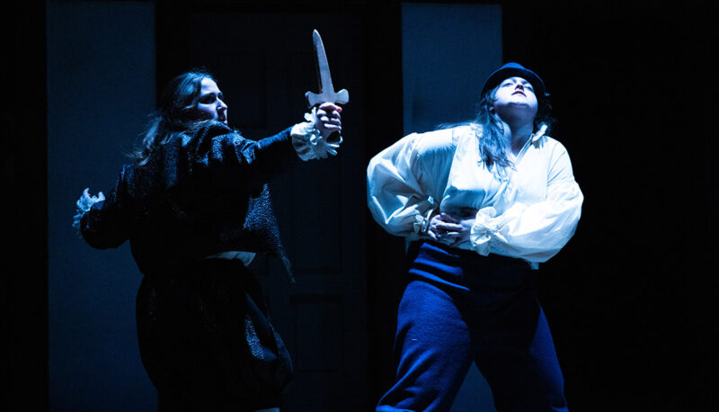 Students performing Shakespeare. Sword fight