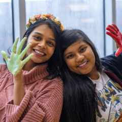 Two students showing off their painted hands