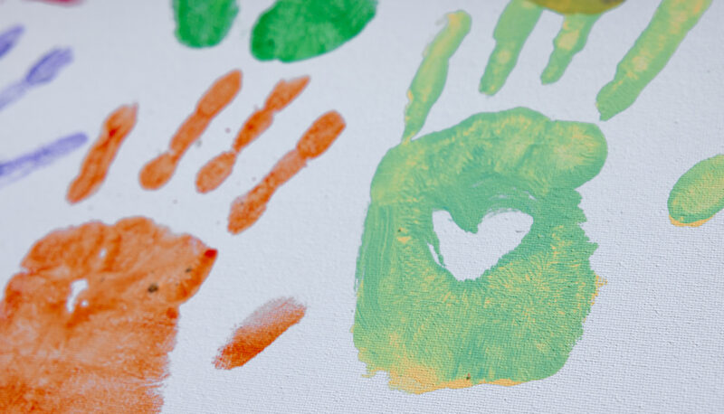 A close up of handprint art work