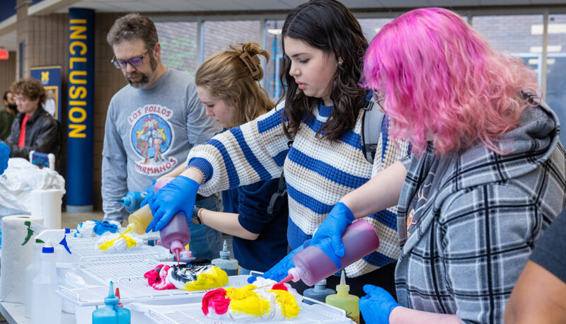 Students tie dying t shirts