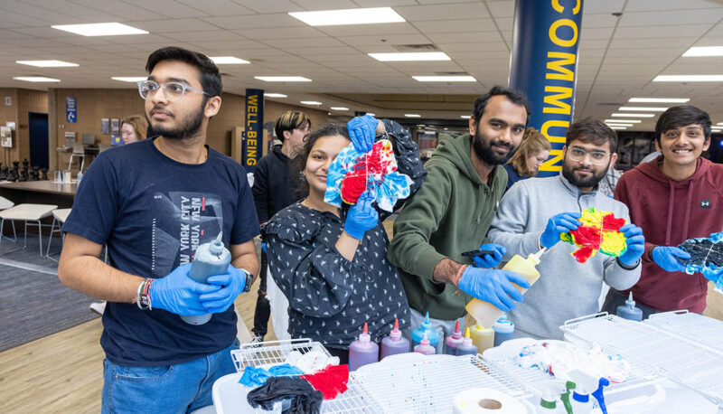 Students tie dying t shirts