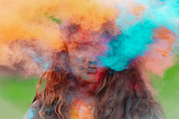 UM-Flint Holi celebration. During this celebration, students cover each other in colored paints as part of a traditional spring celebration.