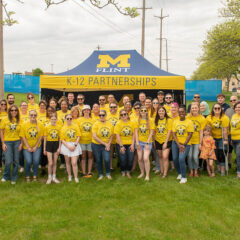 A group photo of Officer Friendly Day volunteers and police officers