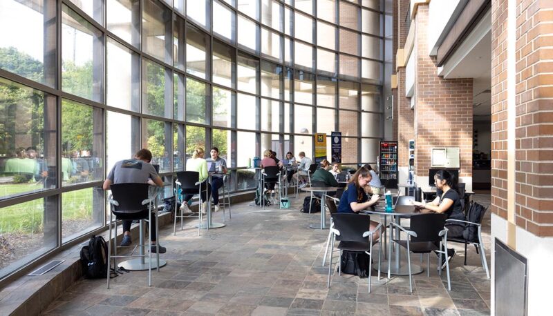 A view of the White Building lobby filled with students