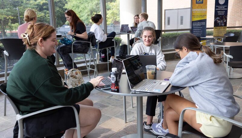 A view of the White Building lobby filled with students