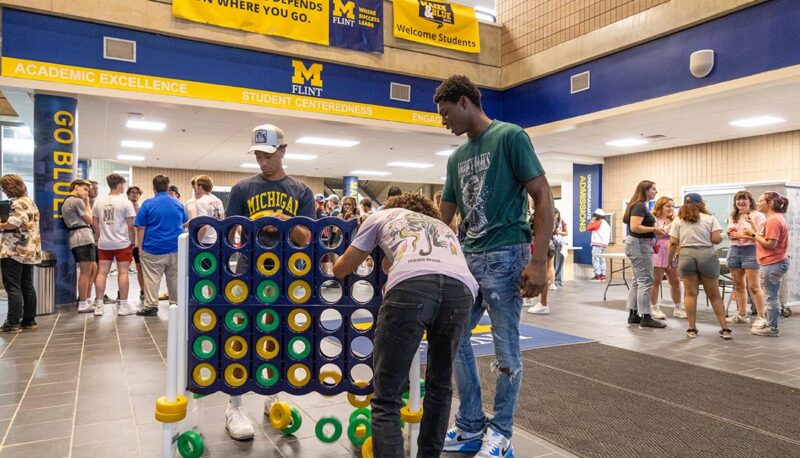 Students playing giant Connect 4.