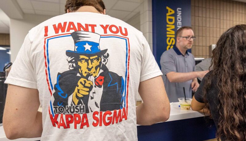 The back of someone's shirt with a photo of Uncle Sam with text "I want you to rush Kappa Sigma."