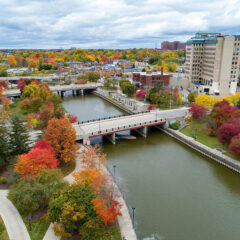 An aerial view of the Flint River and trees in fall color.