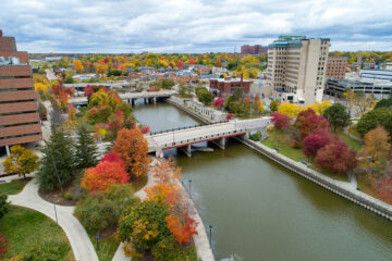 An aerial view of the Flint River and trees in fall color.