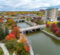 An aerial view of the Flint River and trees in fall color.