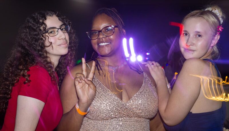 Students dancing during Homecoming in formal attire