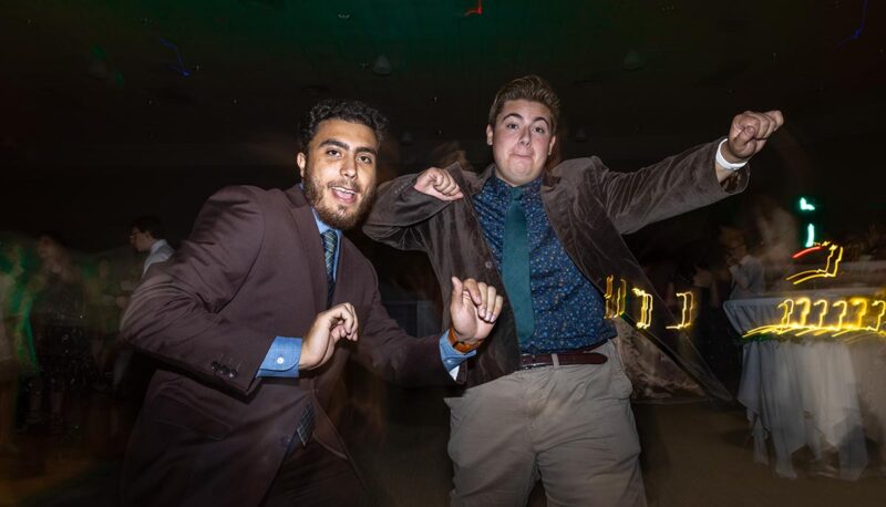 Students dancing during Homecoming in formal attire