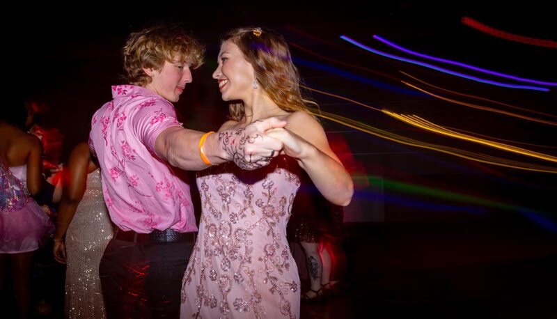 Students dancing during Homecoming in formal attire